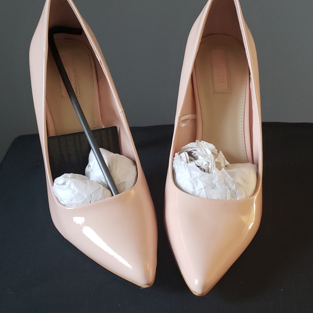 Blush patent pumps